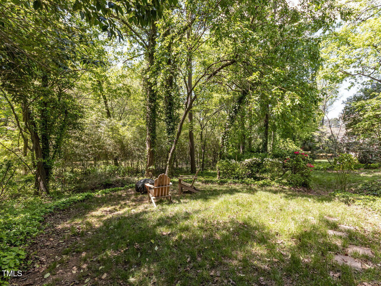 713 Macon Place Raleigh, NC 27609 - Photo 33 of 36 a view of outdoor space with trees all around