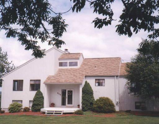 342 Barn Hill Road Monroe, CT 06468 - Photo 1 of 1 a front view of a house with garden