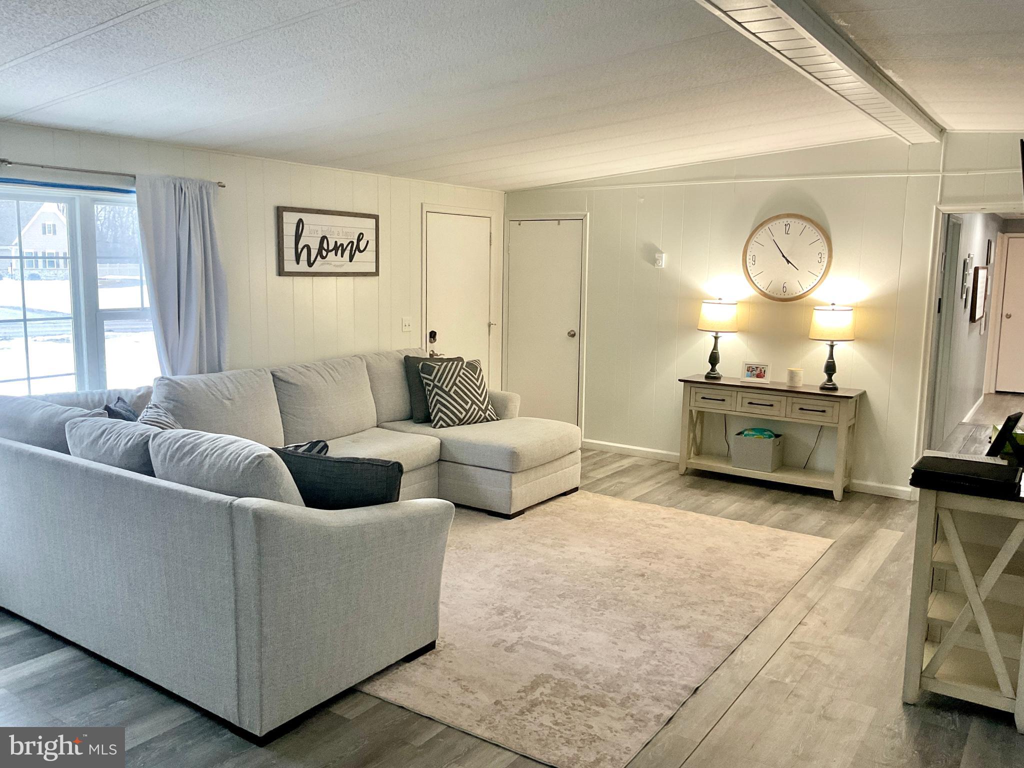 971 Dry Wells Road Quarryville, PA 17566 - Photo 22 of 37 a living room with furniture and a large window
