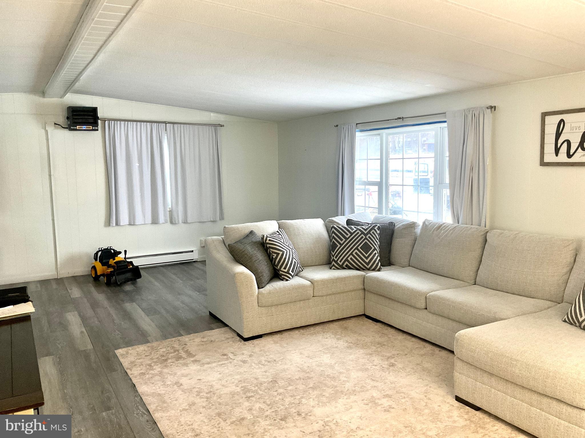 971 Dry Wells Road Quarryville, PA 17566 - Photo 23 of 37 a living room with furniture and a window