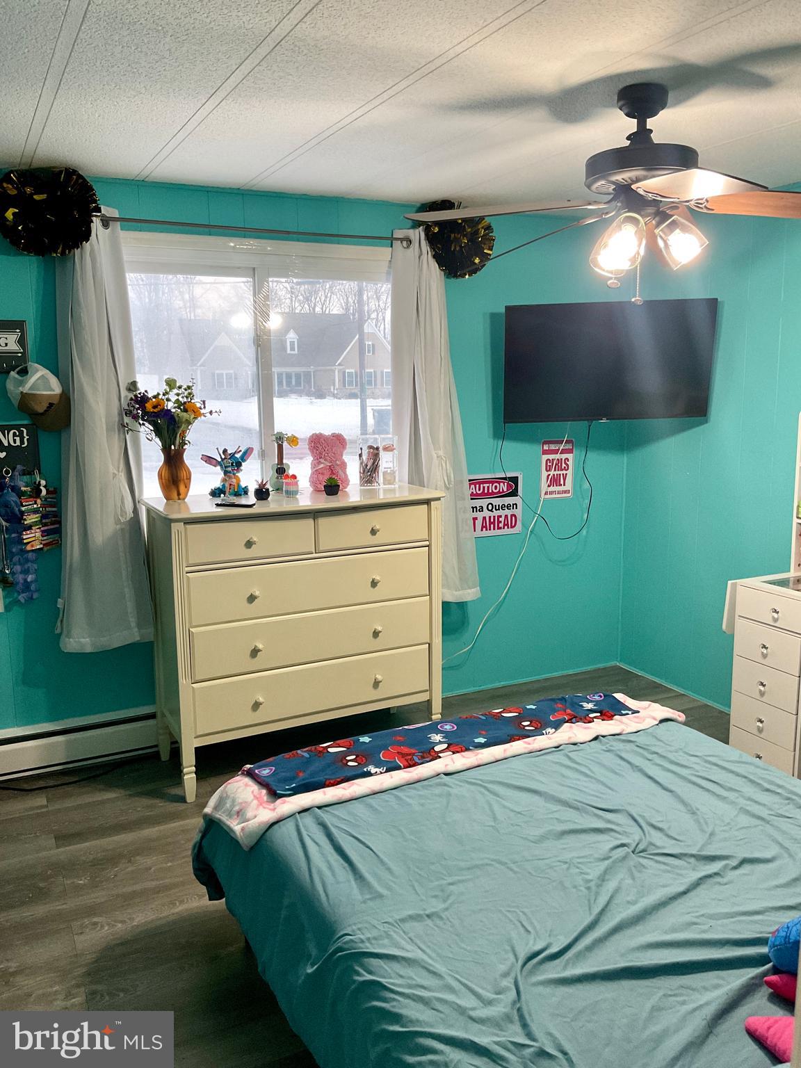 971 Dry Wells Road Quarryville, PA 17566 - Photo 28 of 37 a bed room with a bed mirror and a window