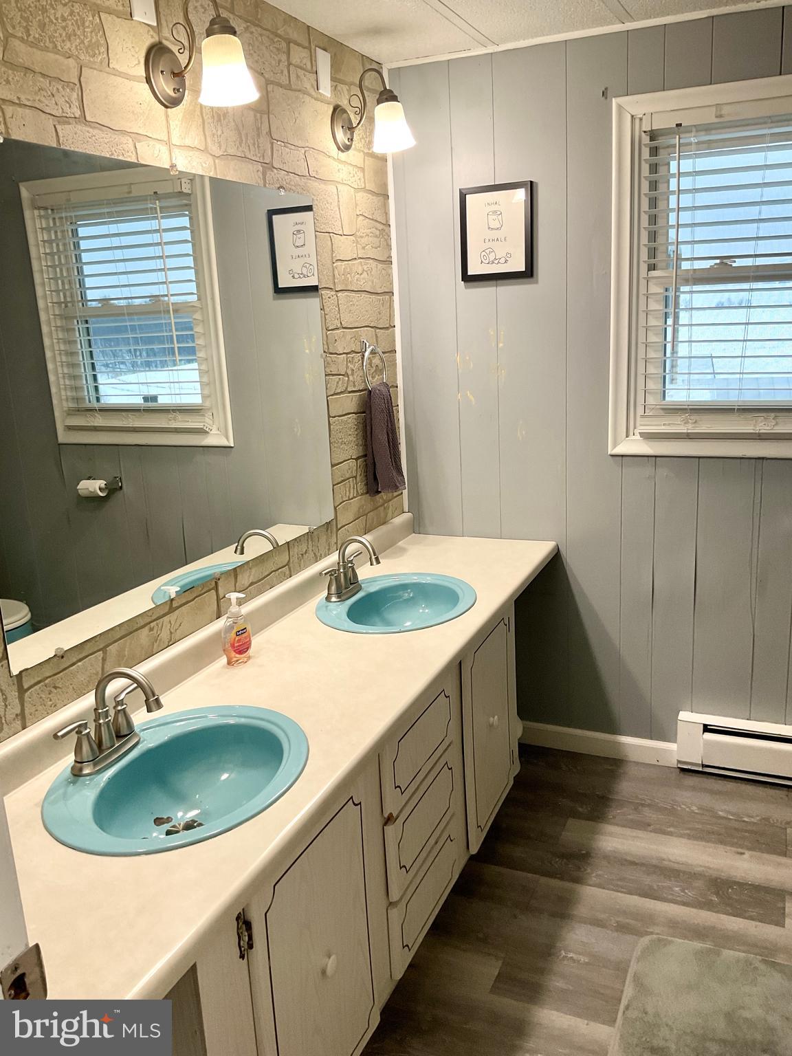 971 Dry Wells Road Quarryville, PA 17566 - Photo 29 of 37 a bathroom with a sink and a mirror