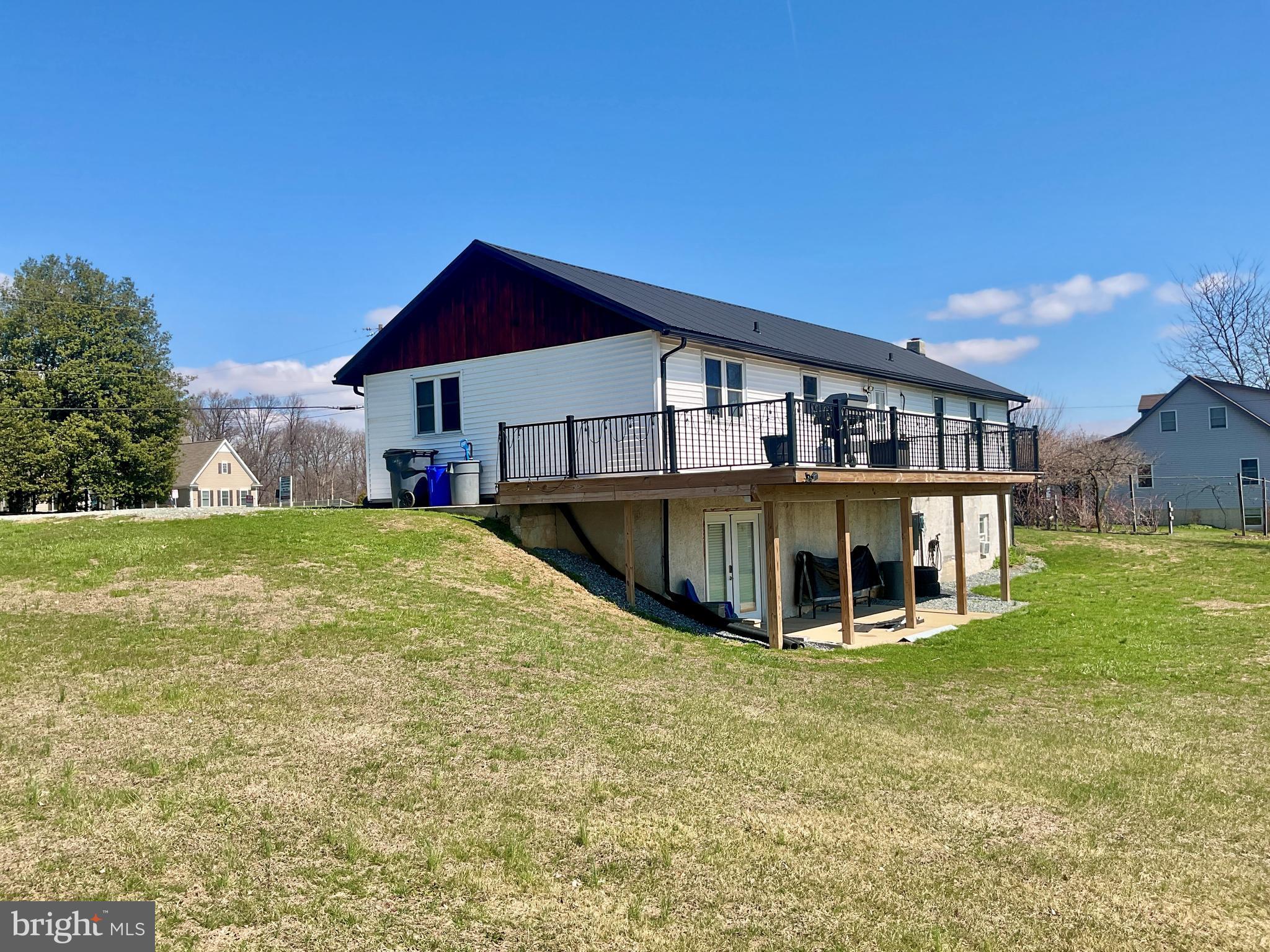 971 Dry Wells Road Quarryville, PA 17566 - Photo 3 of 37 a view of a house with yard and sitting area