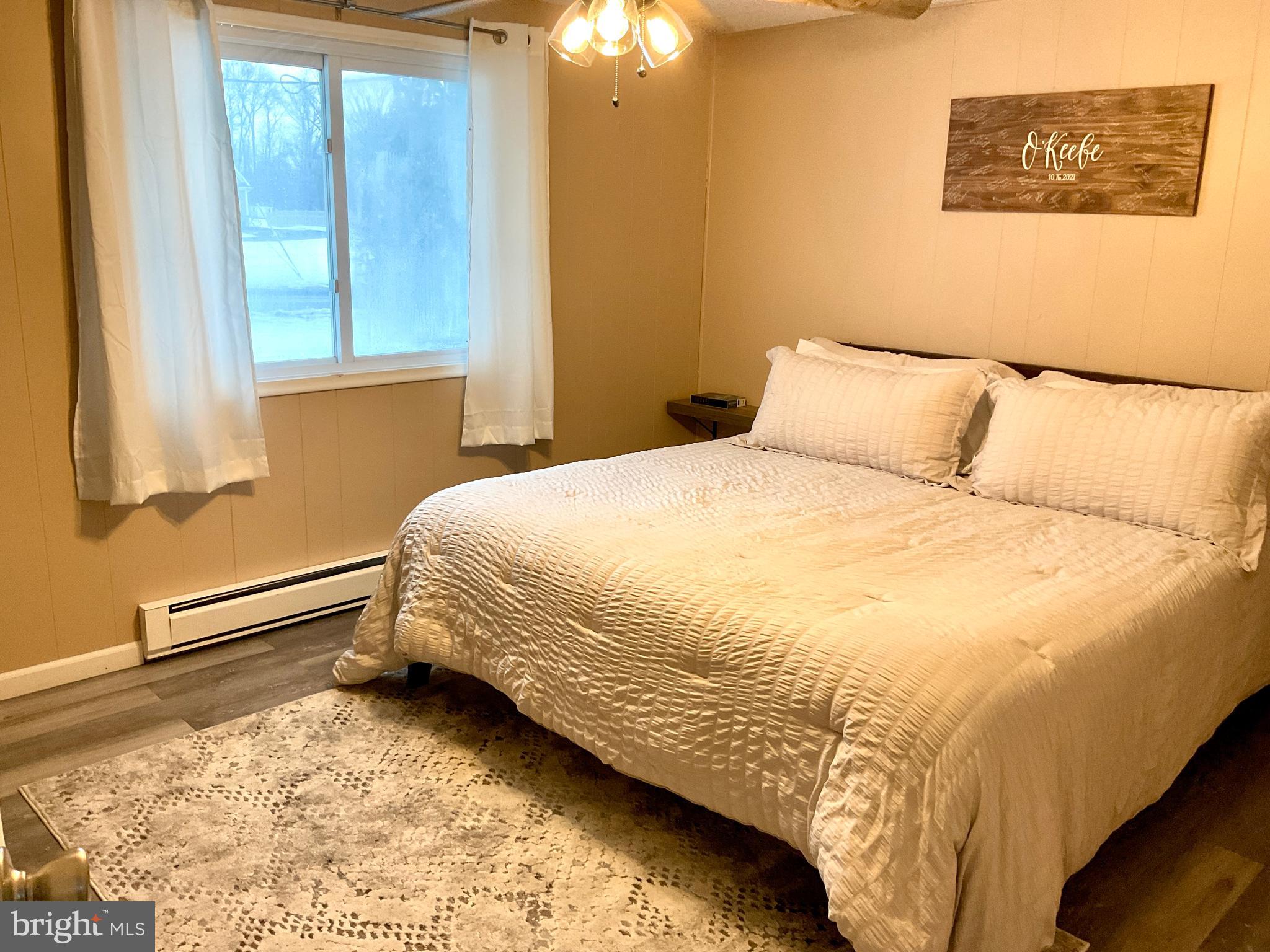 971 Dry Wells Road Quarryville, PA 17566 - Photo 32 of 37 a bedroom with a bed and a window