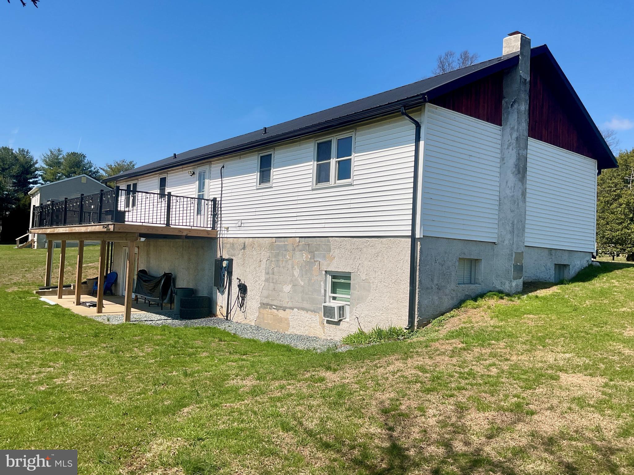 971 Dry Wells Road Quarryville, PA 17566 - Photo 5 of 37 a backyard of a house with table and chairs