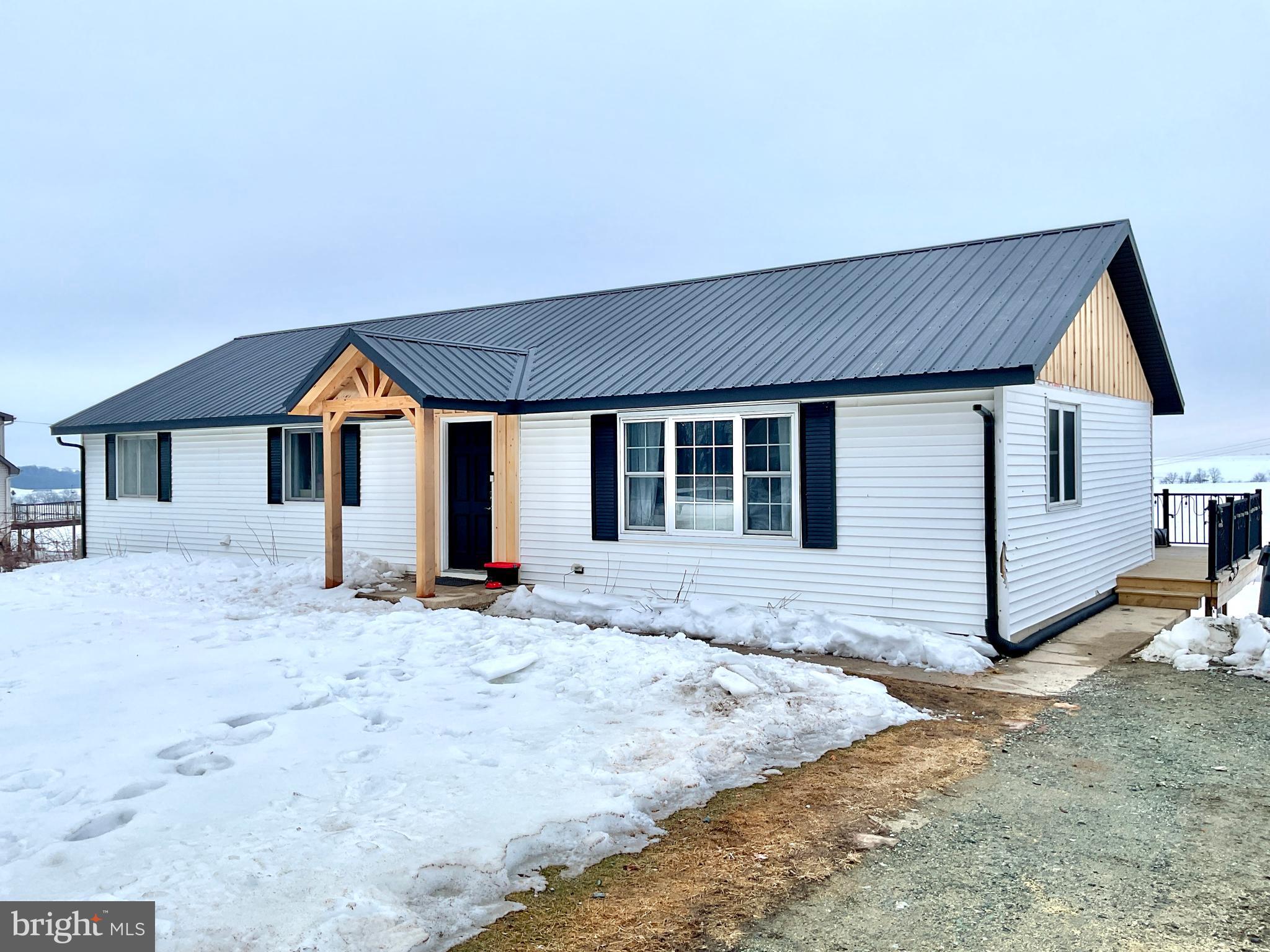 971 Dry Wells Road Quarryville, PA 17566 - Photo 8 of 37 a view of a house with a yard