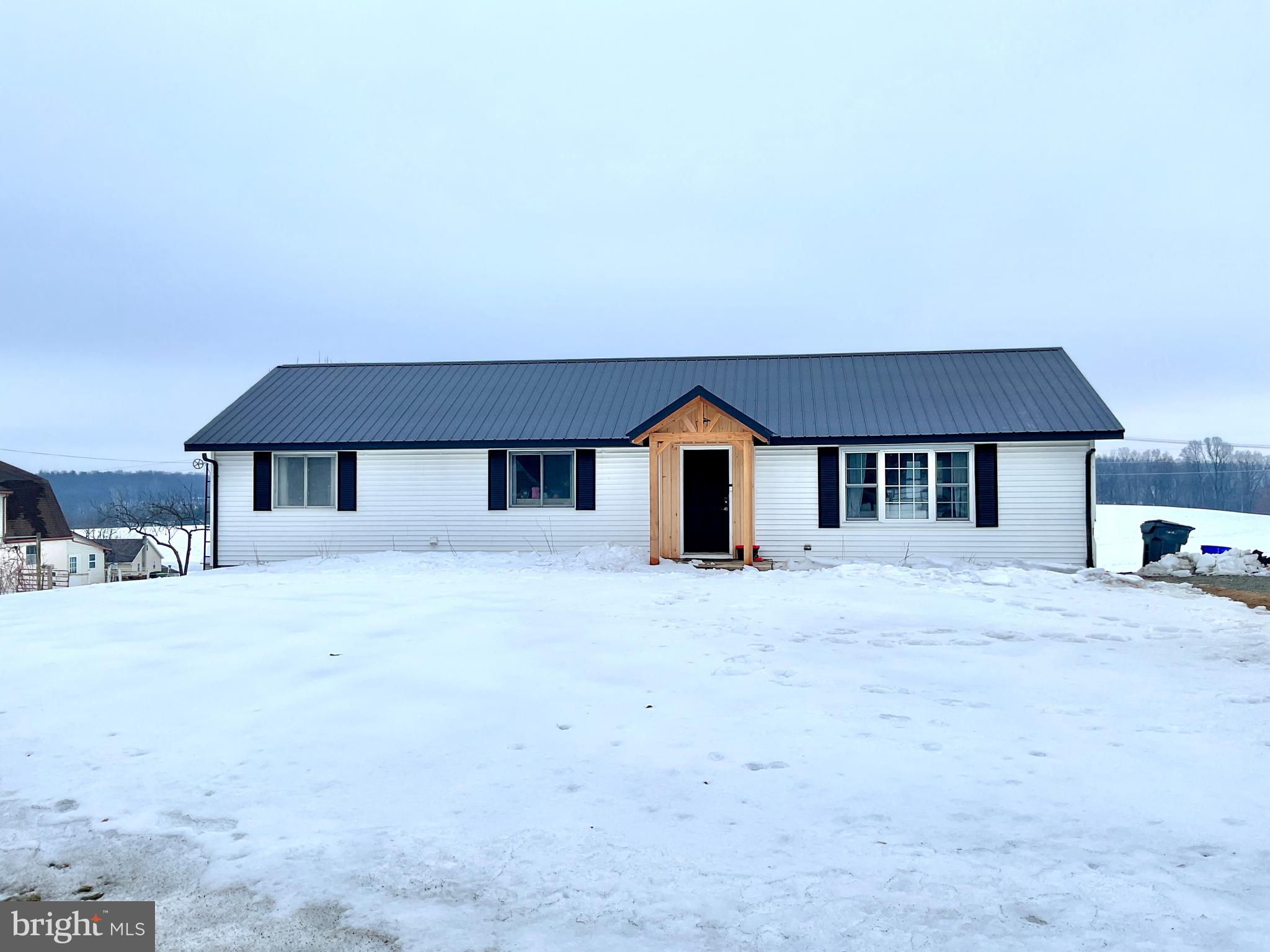 971 Dry Wells Road Quarryville, PA 17566 - Photo 9 of 37 a front view of a house with a yard
