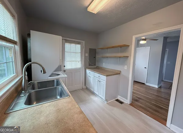 a bathroom with a sink and a bathtub