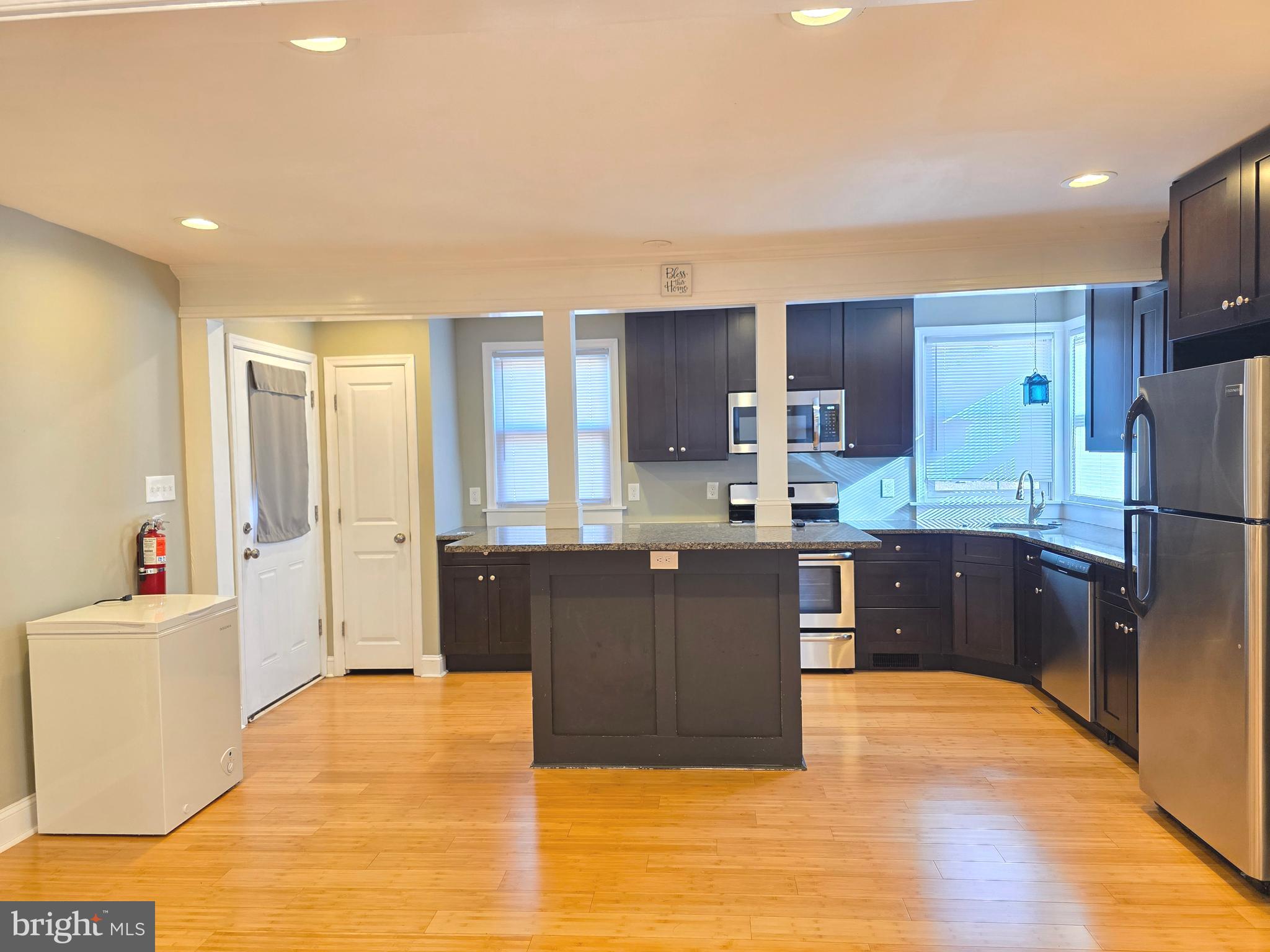 27 Goldy Drive Gloucester City, NJ 08030 - Photo 14 of 41 a kitchen with stainless steel appliances granite countertop a refrigerator and a sink