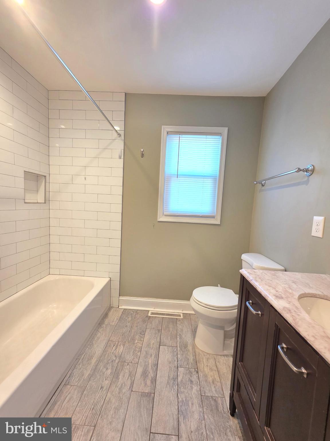 27 Goldy Drive Gloucester City, NJ 08030 - Photo 30 of 41 a bathroom with a sink a toilet and bathtub