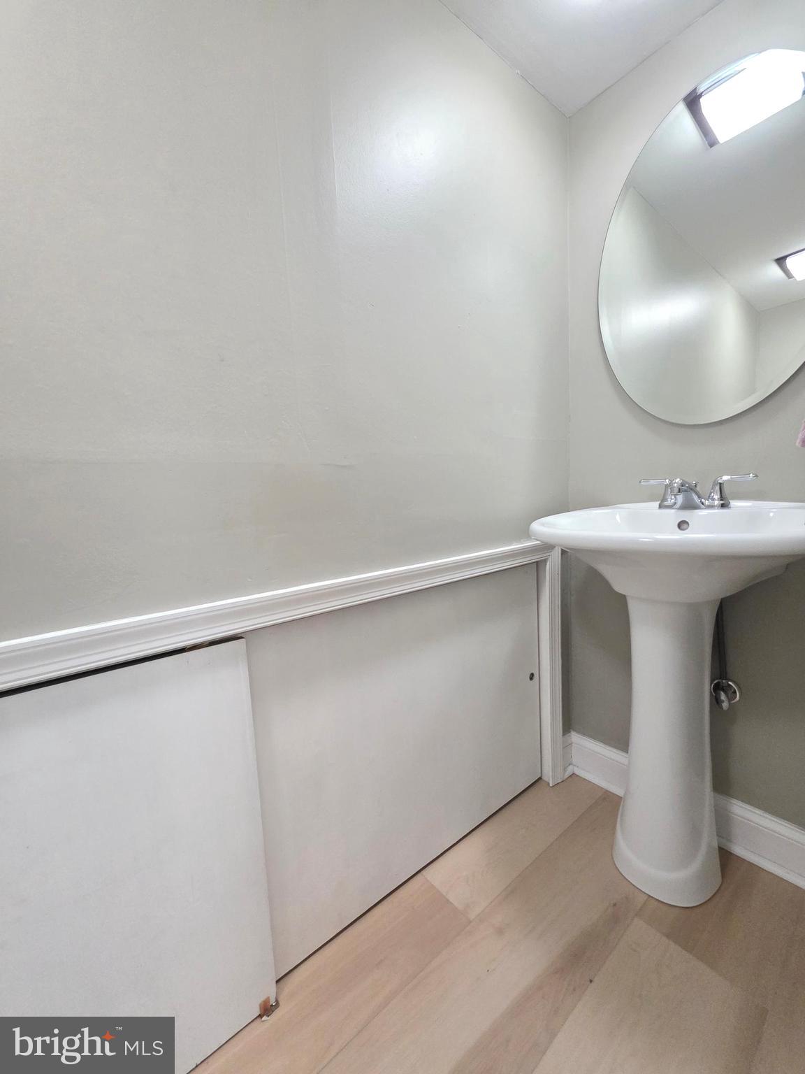 27 Goldy Drive Gloucester City, NJ 08030 - Photo 35 of 41 a bathroom with a sink and mirror