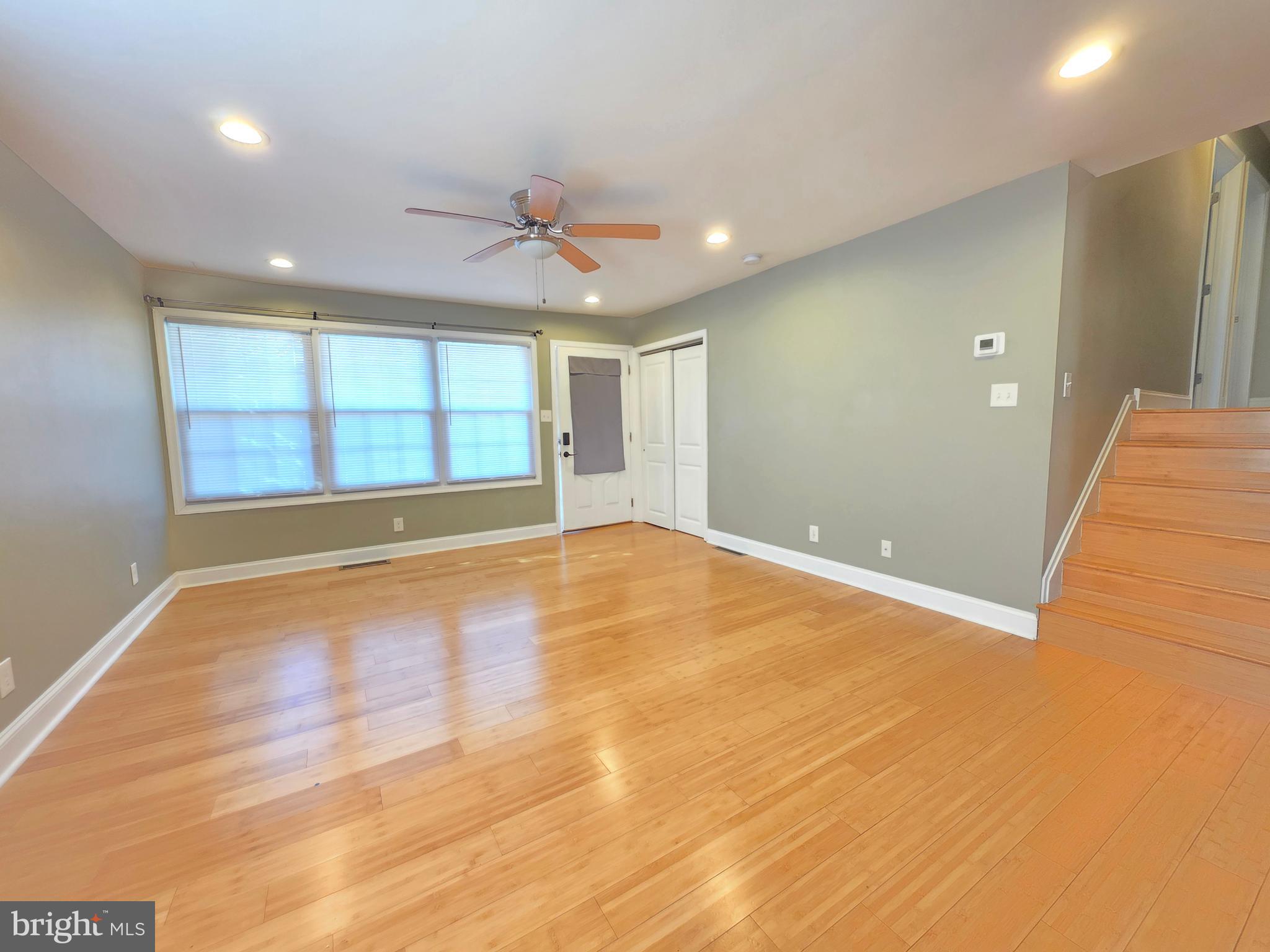 27 Goldy Drive Gloucester City, NJ 08030 - Photo 5 of 41 a view of an empty room with window and wooden floor