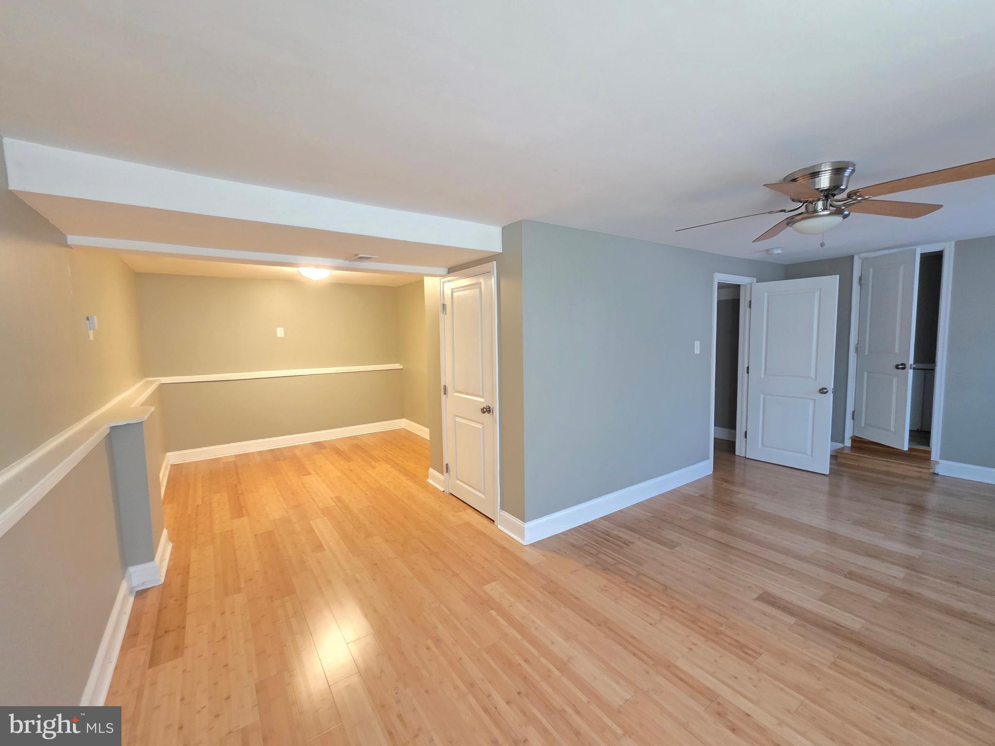 27 Goldy Drive Gloucester City, NJ 08030 - Photo 8 of 41 a view of an empty room with wooden floor