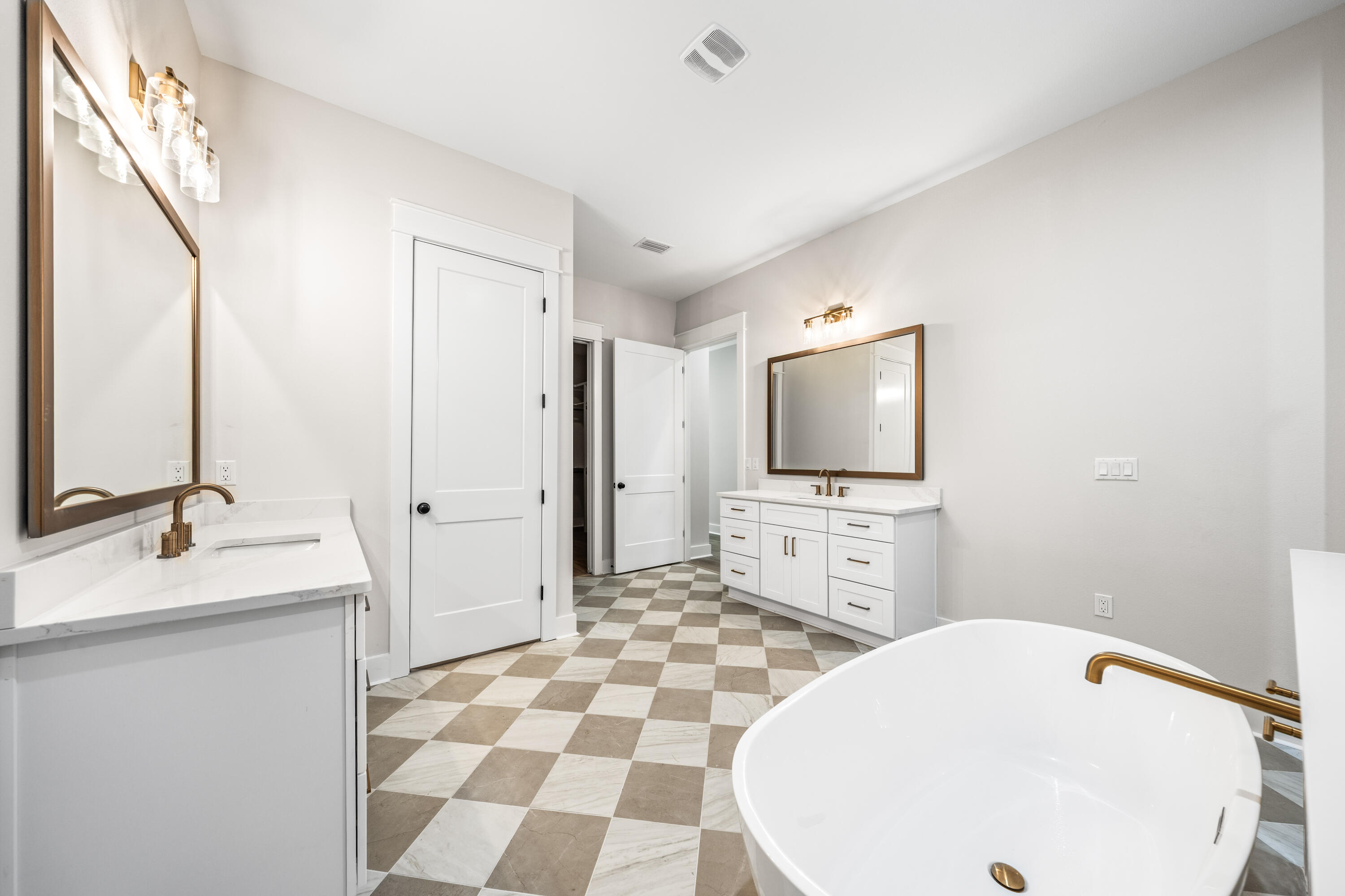 112 East Captain Fritz Way Freeport, FL 32439 - Photo 26 of 114 a bathroom with a sink and a mirror