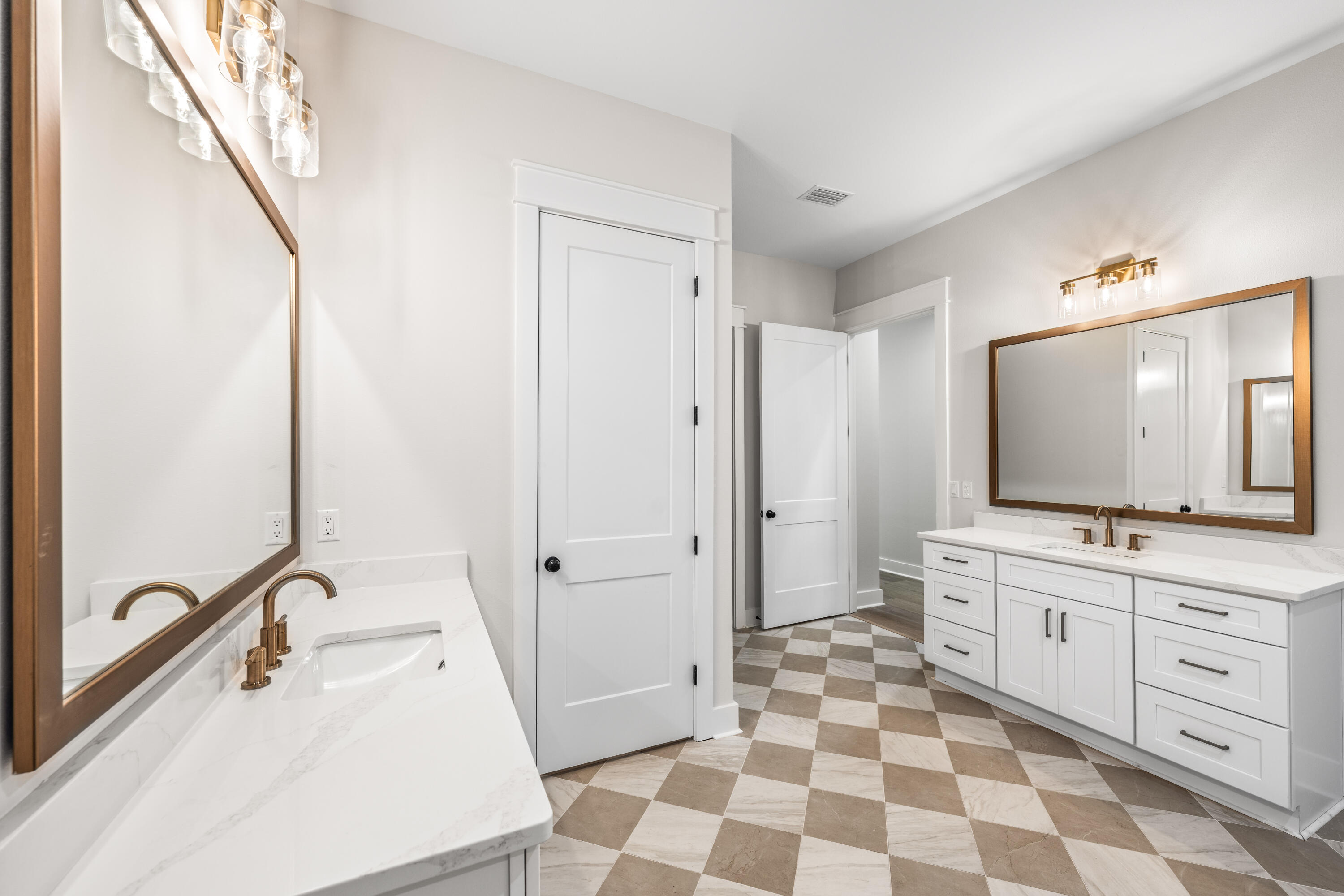 112 East Captain Fritz Way Freeport, FL 32439 - Photo 27 of 114 a bathroom with a sink a toilet a mirror and shower