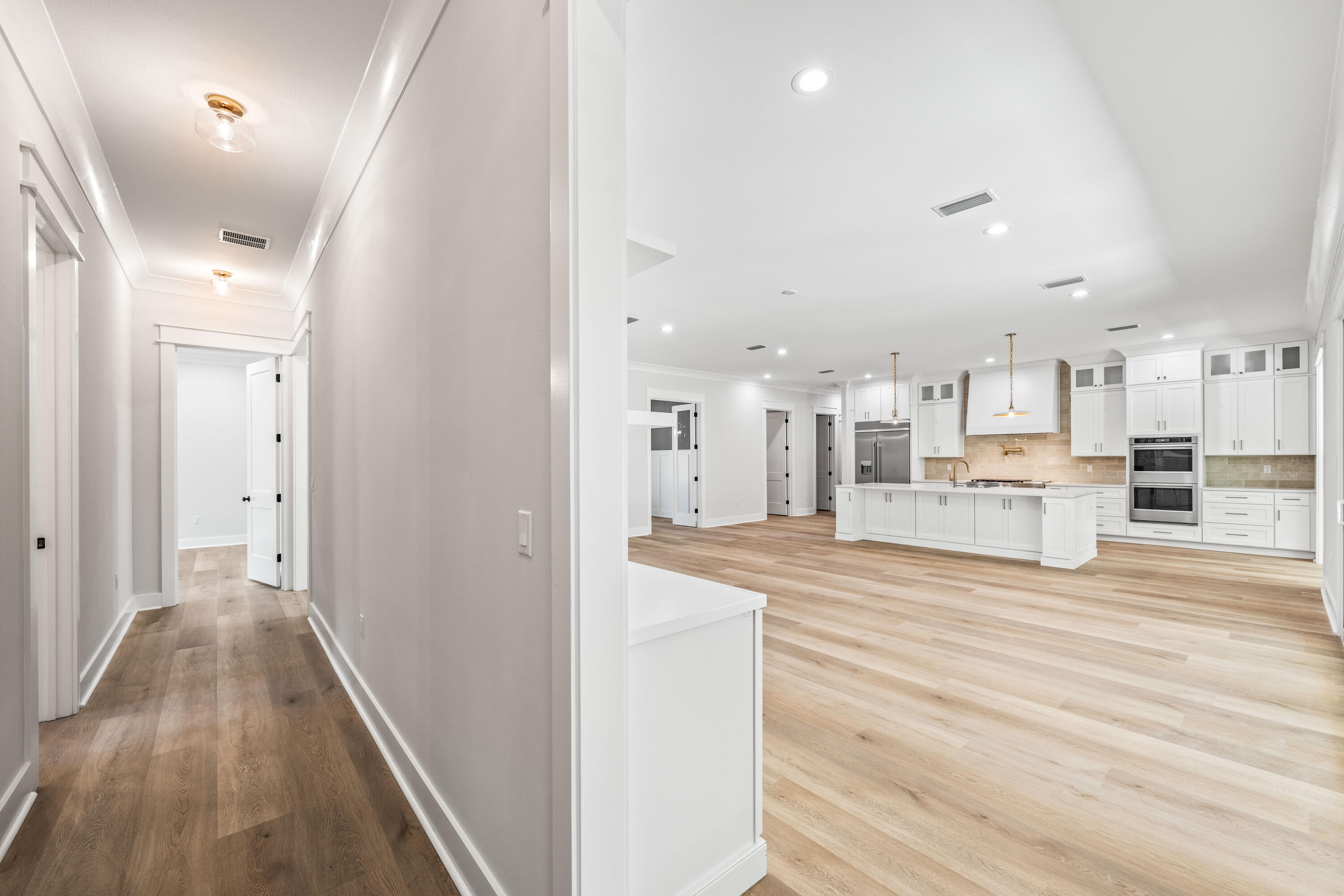 112 East Captain Fritz Way Freeport, FL 32439 - Photo 33 of 114 a view of a kitchen from the hallway