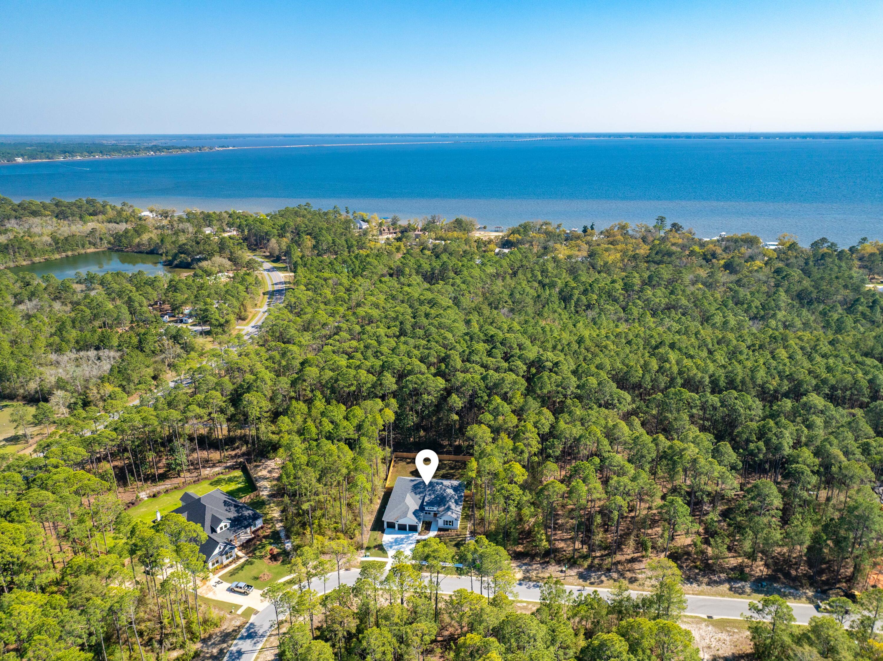 112 East Captain Fritz Way Freeport, FL 32439 - Photo 63 of 114 a view of lake and mountain