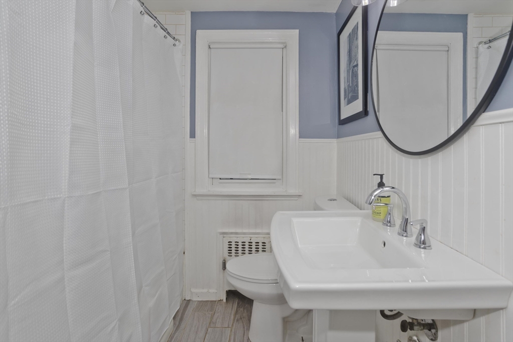 52 Gillette Circle Springfield, MA 01118 - Photo 12 of 30 a bathroom with a sink and a mirror