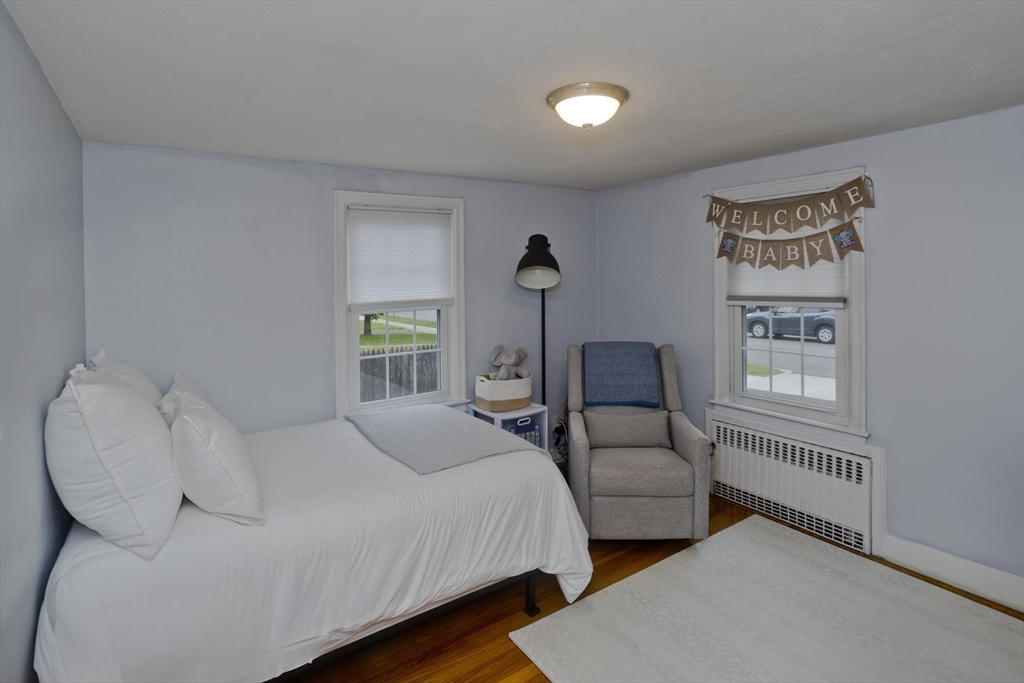 52 Gillette Circle Springfield, MA 01118 - Photo 13 of 30 a bedroom with two beds and a window
