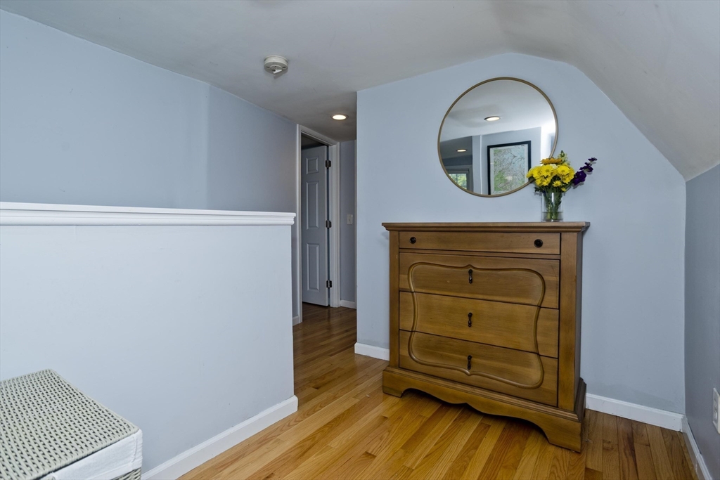 52 Gillette Circle Springfield, MA 01118 - Photo 15 of 30 a view of a hallway with wooden floor