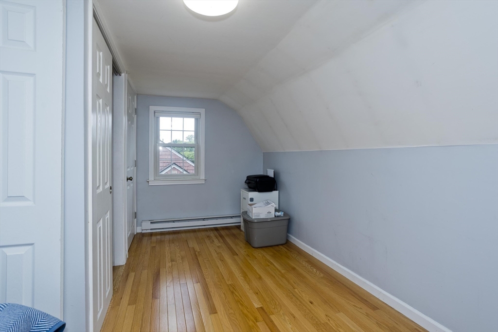 52 Gillette Circle Springfield, MA 01118 - Photo 16 of 30 a room with wooden floor and a window