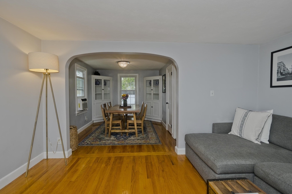 52 Gillette Circle Springfield, MA 01118 - Photo 6 of 30 a living room with a couch and a table