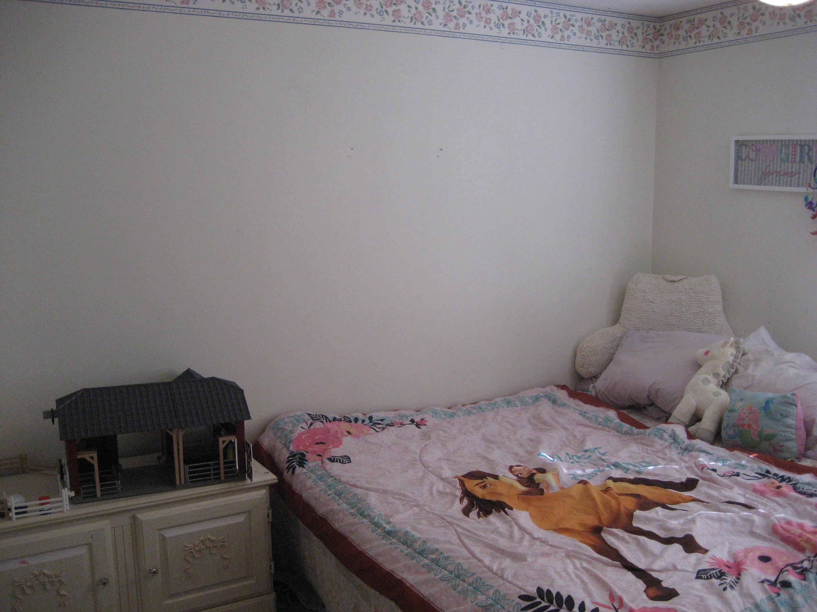 1130 Seaton Loop Adamsville, TN 38310 - Photo 17 of 24 a bedroom with a bed and dresser