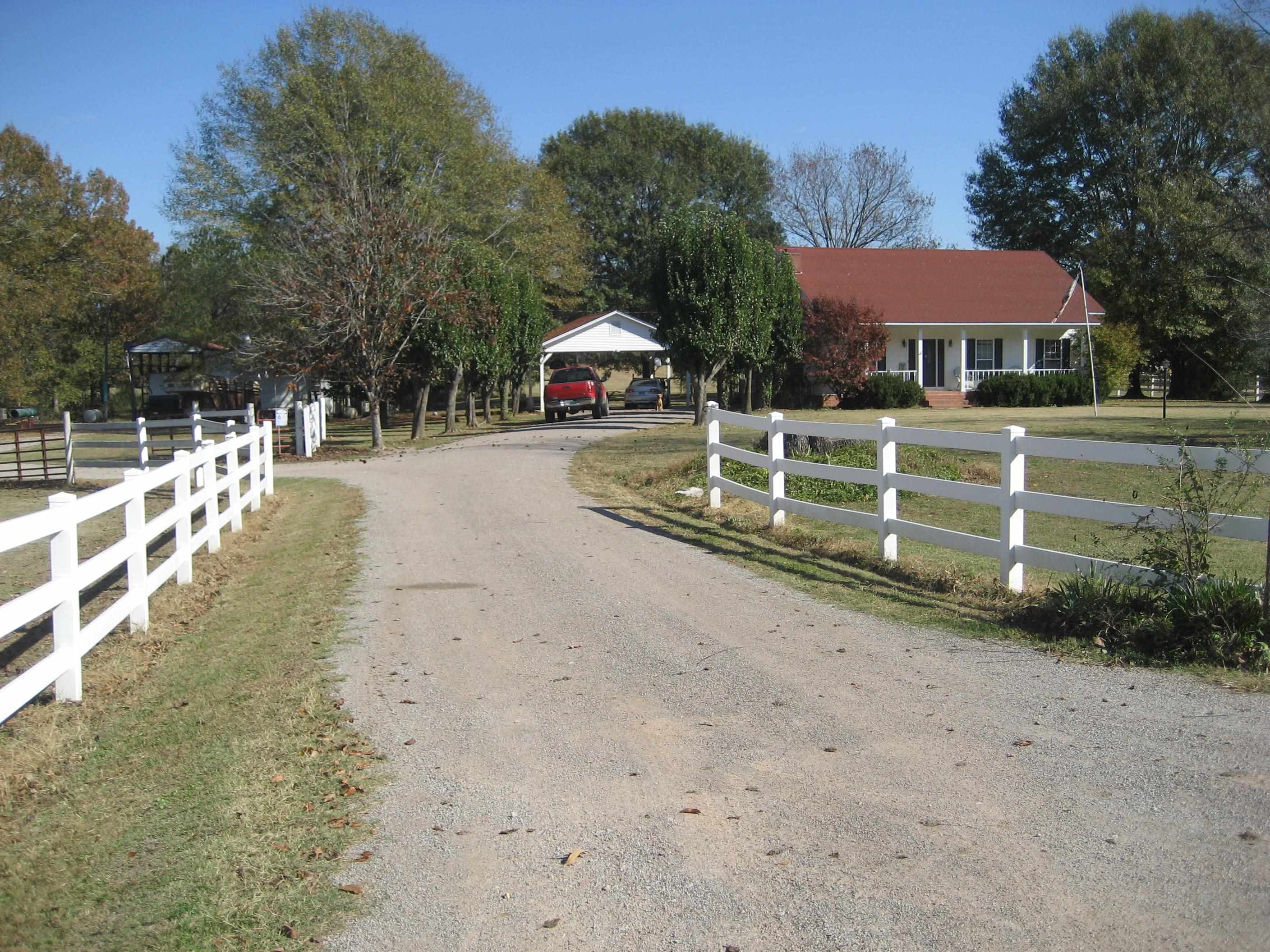 1130 Seaton Loop Adamsville, TN 38310 - Photo 19 of 24 a front view of a house with a yard