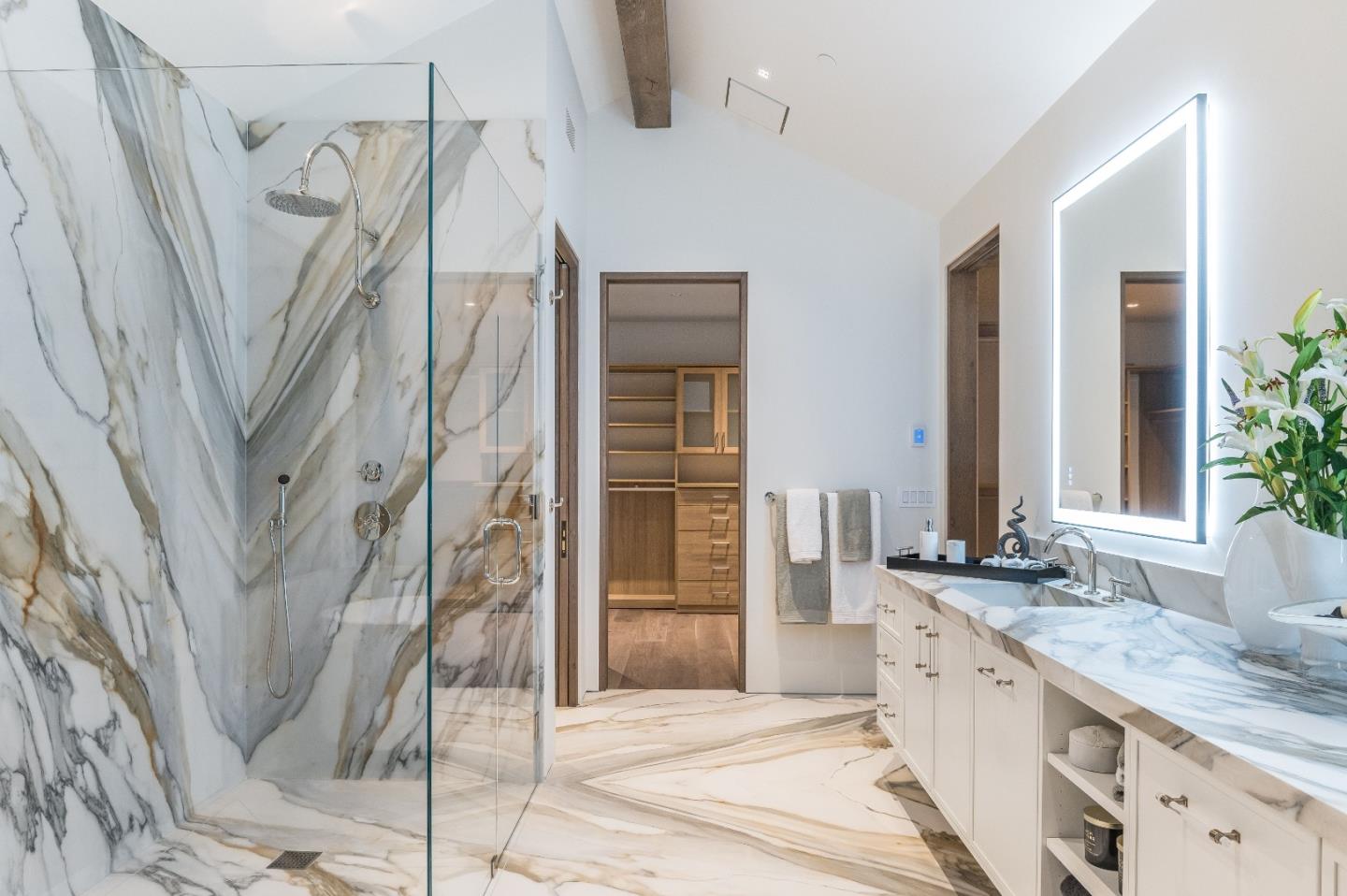 8140 Manjares Road Monterey, CA 93940 - Photo 13 of 20 a bathroom with a granite countertop sink a mirror and shower