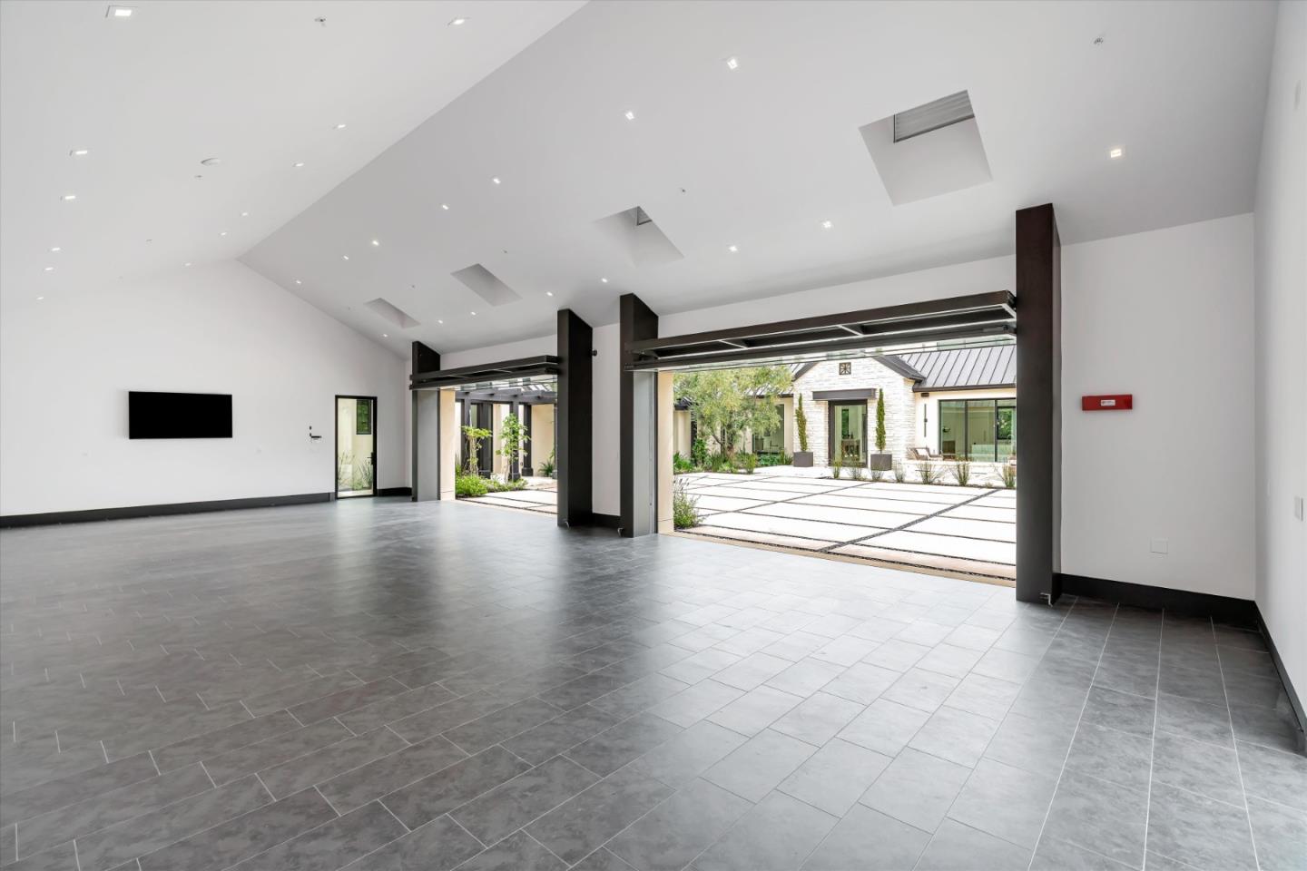 8140 Manjares Road Monterey, CA 93940 - Photo 18 of 20 a view of an empty room with window and wooden floor