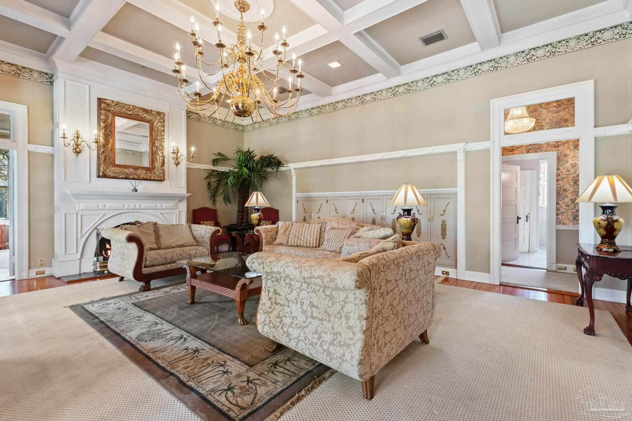 1701 Sowell Road Brewton, AL 36426 - Photo 20 of 72 a living room with furniture and a chandelier