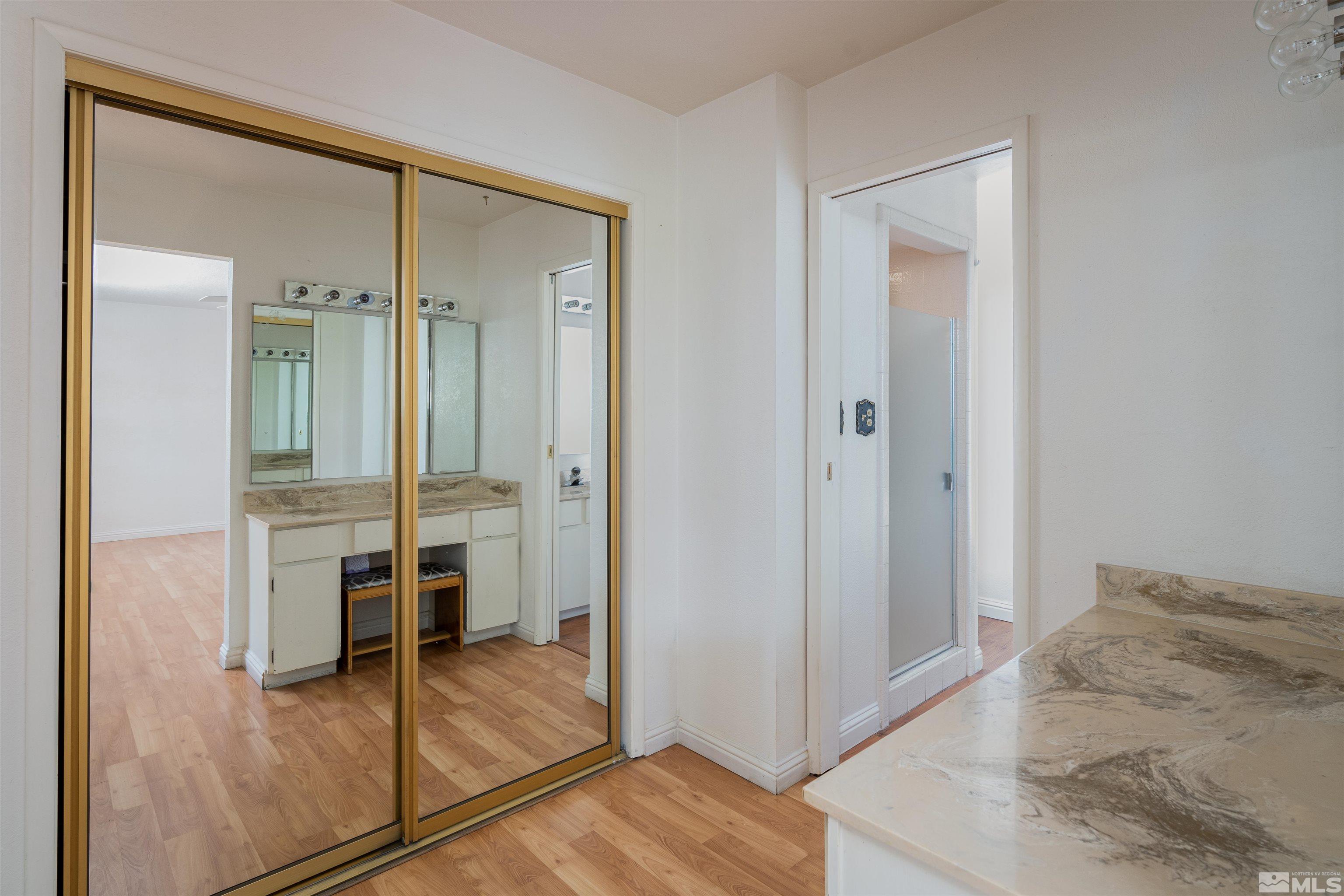 5705 Blue Hills Drive Reno, NV 89502 - Photo 15 of 29 a view of a bedroom with a wardrobe space