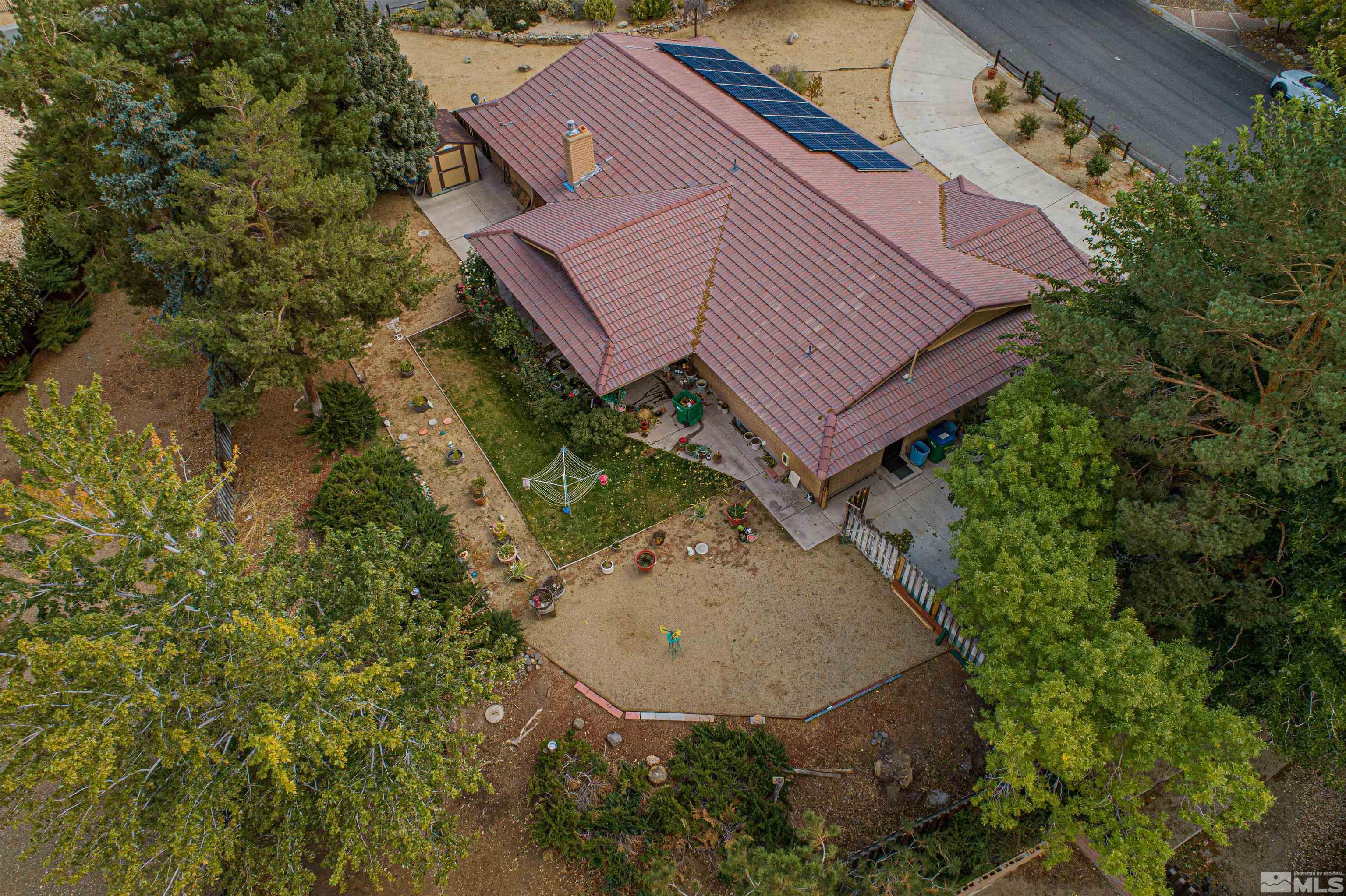 5705 Blue Hills Drive Reno, NV 89502 - Photo 2 of 29 an aerial view of a house with a yard and trees