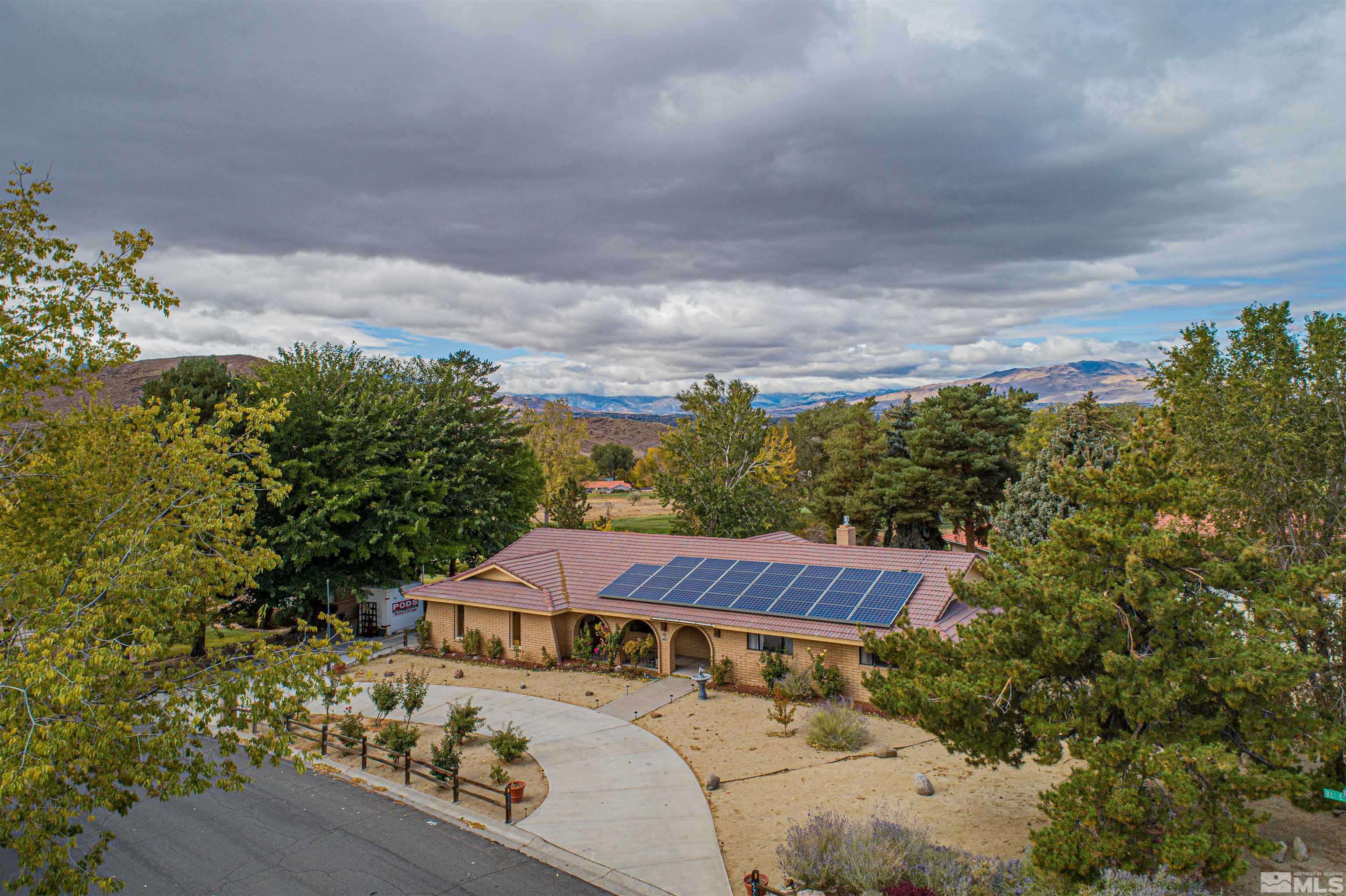 5705 Blue Hills Drive Reno, NV 89502 - Photo 27 of 29 a view of a house with a yard and sitting area