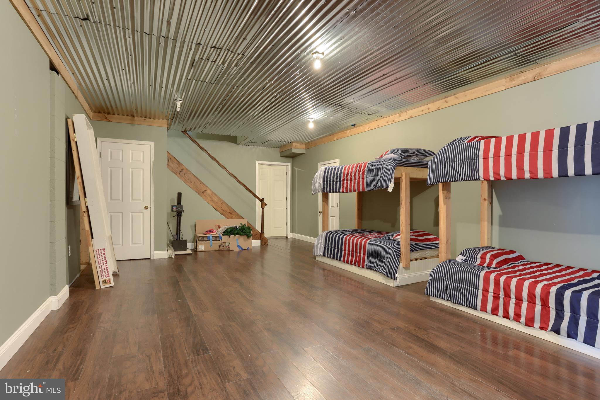 56 Forest Road Robesonia, PA 19551 - Photo 46 of 73 Finished lower level, laminate fl, built in bunks