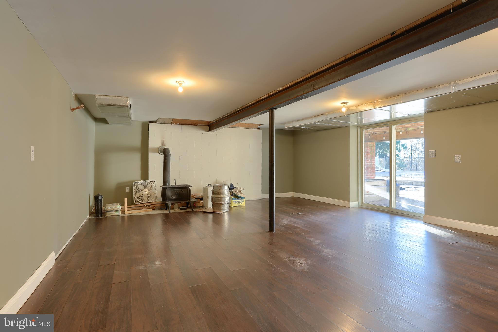 56 Forest Road Robesonia, PA 19551 - Photo 48 of 73 Finished lower level, wood stove, walk out