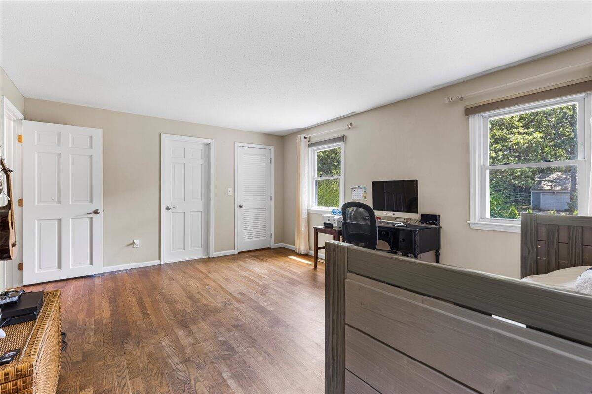 48 Valley Brook Road Centerville, MA 02632 - Photo 25 of 34 a view of a livingroom with furniture and a flat screen tv
