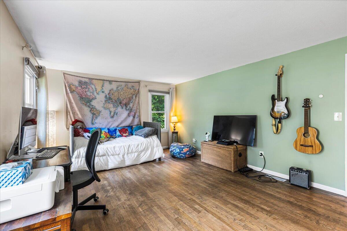48 Valley Brook Road Centerville, MA 02632 - Photo 26 of 34 a living room with furniture and a flat screen tv