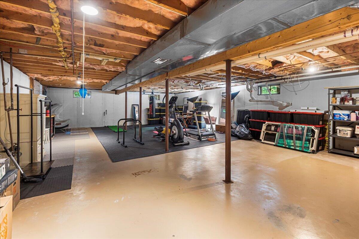 48 Valley Brook Road Centerville, MA 02632 - Photo 30 of 34 a view of a patio with table and chairs