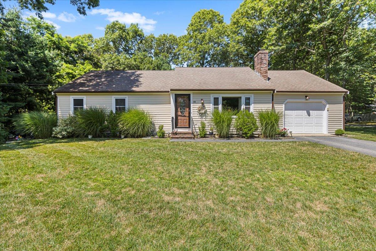 48 Valley Brook Road Centerville, MA 02632 - Photo 3 of 34 front view of a house with a yard