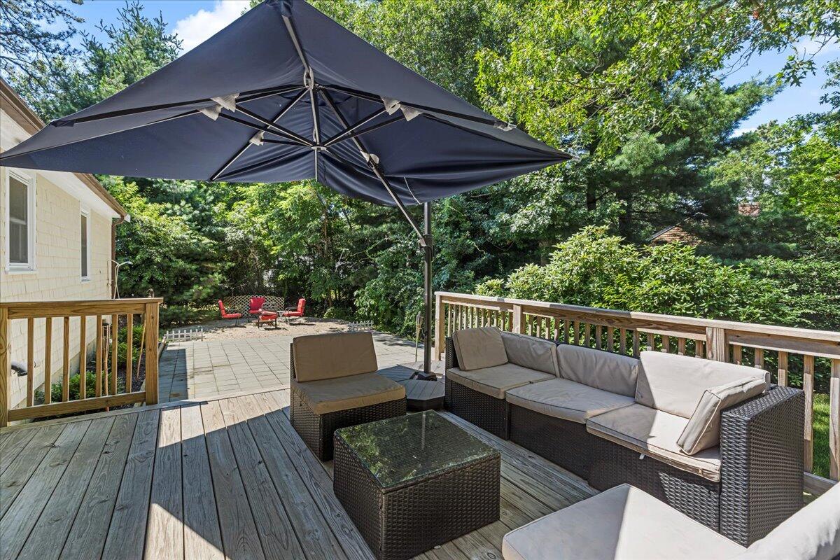48 Valley Brook Road Centerville, MA 02632 - Photo 8 of 34 a view of sitting area with furniture and wooden deck