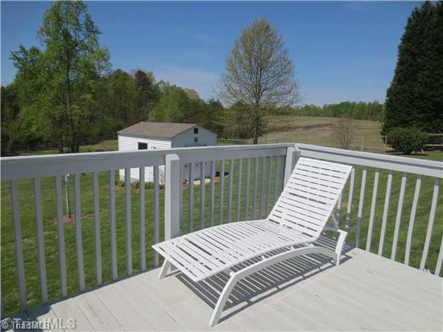 4600 Grubbs Road Walkertown, NC 27051 - Photo 14 of 16 Patio/Deck. DECK IS A WONDERFUL SPACE TO ENTERTAIN, OR JUST CHILL, THE AREA IS COMPLETELY PRIVATE AND SECLUDED - FENCED 2.5 ACRES