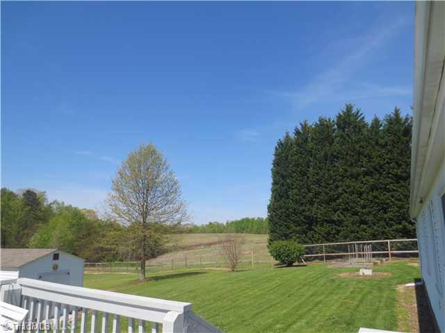 4600 Grubbs Road Walkertown, NC 27051 - Photo 15 of 16 View. LOVELY VIEW OF MEADOW AND ACREAGE FROM DECK!!