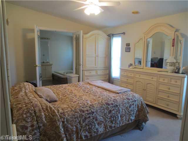 4600 Grubbs Road Walkertown, NC 27051 - Photo 5 of 16 Master Bedroom. HUGE MASTER WITH LARGE CLOSETS AND PRIVATE BATHROOM WITH SHOWER AND HUGE GARDEN TUB.