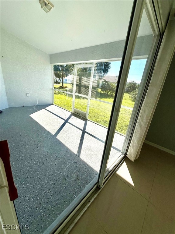2911 40th Street Southwest Lehigh Acres, FL 33976 - Photo 19 of 22 a view of an empty room with a window