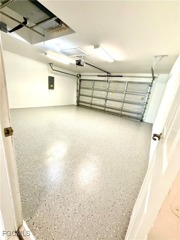 2911 40th Street Southwest Lehigh Acres, FL 33976 - Photo 21 of 22 a view of a room with racks on the wall