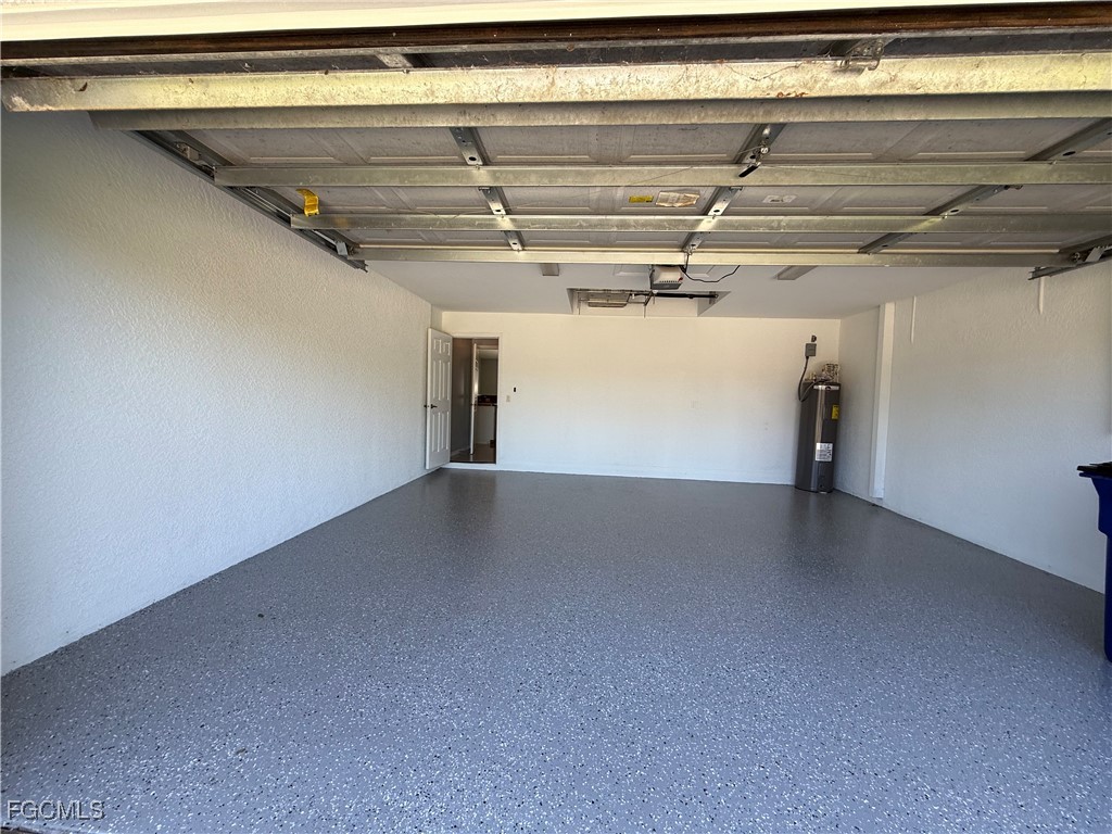2911 40th Street Southwest Lehigh Acres, FL 33976 - Photo 22 of 22 a view of a garage