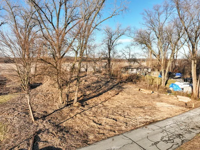 a view of a backyard of the house