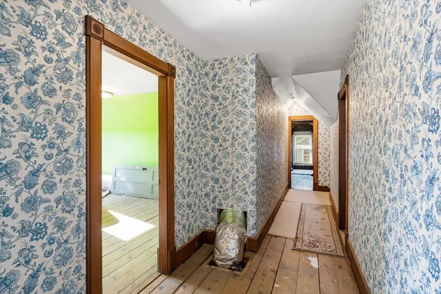 a view of a room with a large window