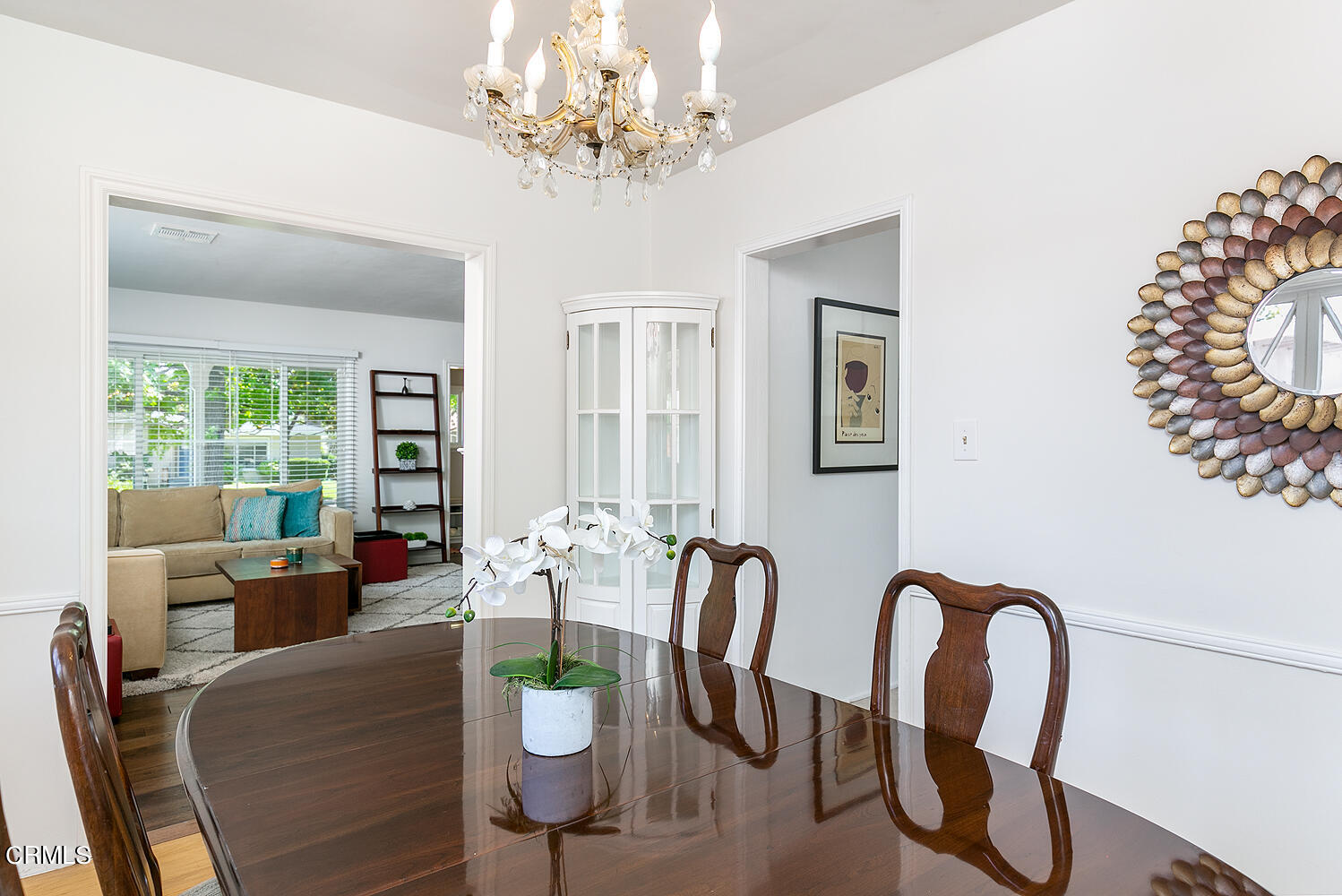 2375 East Woodlyn Road Pasadena, CA 91104 - Photo 12 of 33 a dining room with furniture a chandelier and window